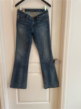 Ag Adriano Goldschmied Distressed Blue Flare Jeans